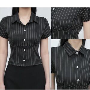 Black button down shirt with white stripe. Worn once
